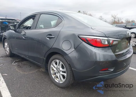 2018 Toyota Yaris Ia из США, поврежденный, VIN 3MYDLBYV6JY318850